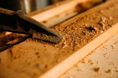 Hand chisel work on a timber joint in the Lidan workshop